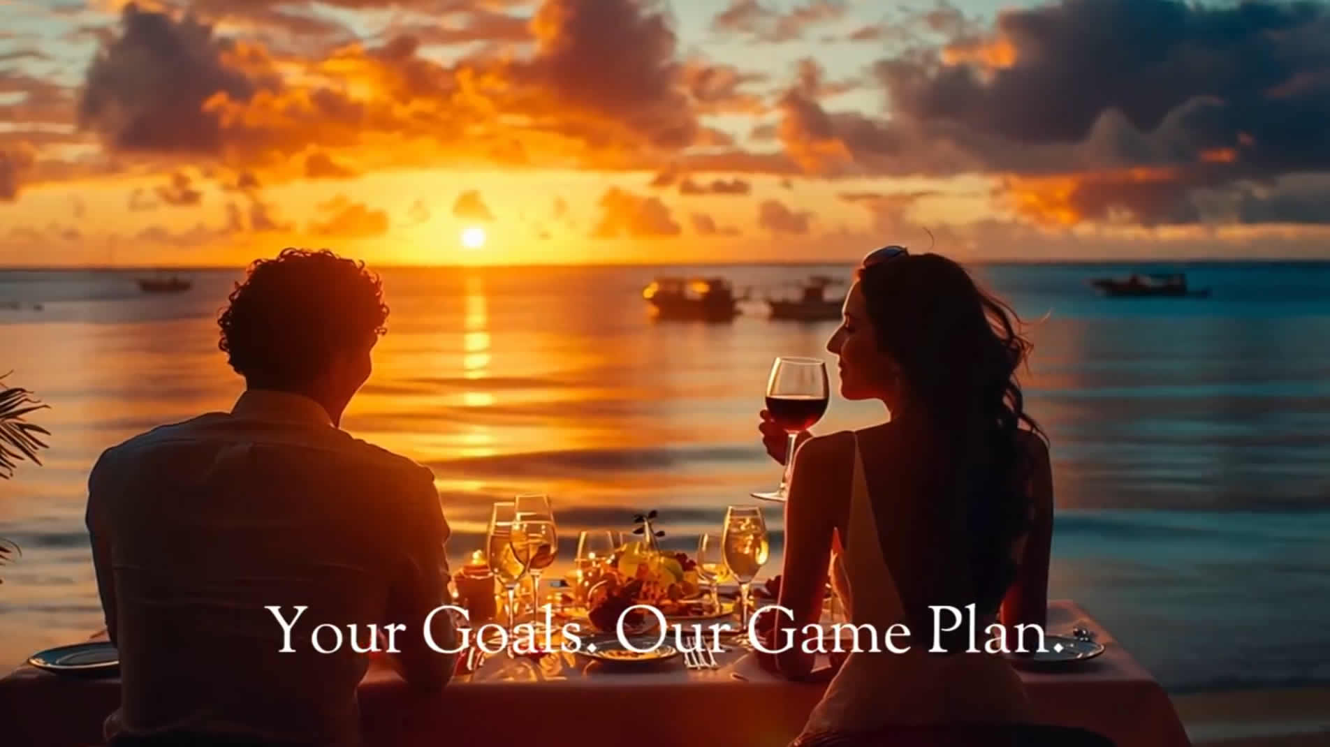 Couple dining at sunset by the sea.